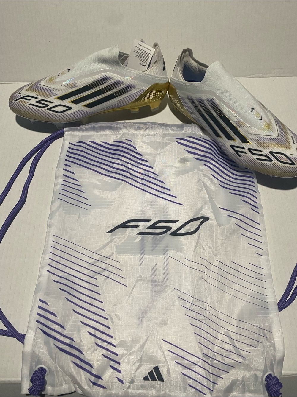 adidas F50 Laceless Soccer Cleats - White with Gold & Purple Accents